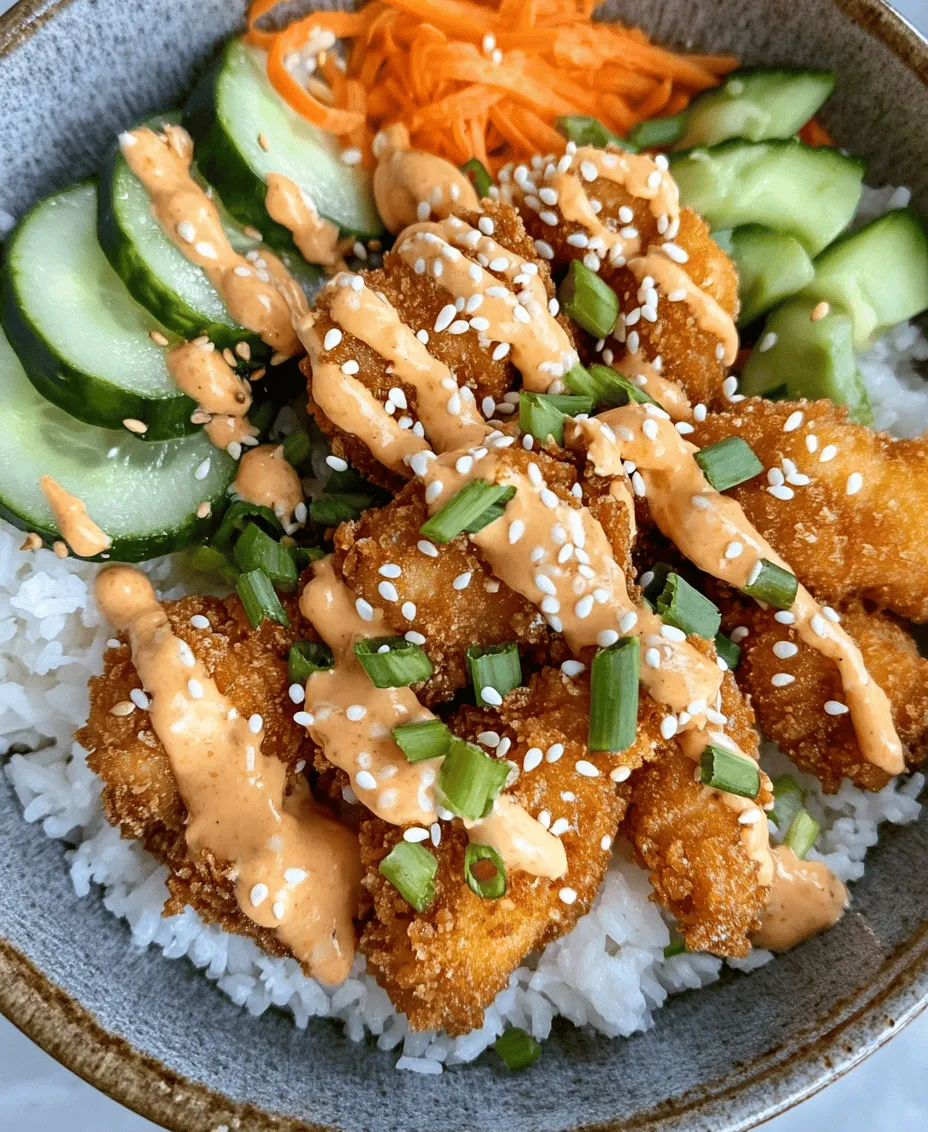 A Bang Bang Chicken Bowl is more than just a meal; it's an experience filled with flavor and texture. The star of this dish is succulent, crispy fried chicken, which is typically seasoned and coated in a flavorful batter. This chicken is then placed atop a bed of fresh vegetables, creating a colorful and inviting presentation. The dish is completed with a signature Bang Bang sauce, which is both creamy and spicy, adding a delightful kick to every bite. The combination of crunchy, fresh veggies and rich sauce elevates this dish, making it a favorite among food lovers.