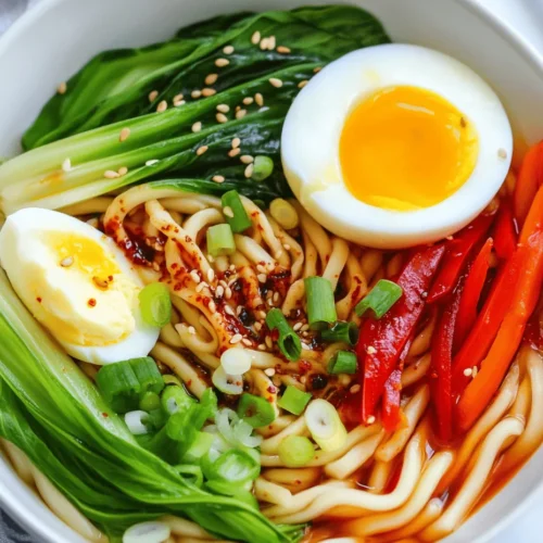 Step into the vibrant world of Asian cuisine with our quick and flavorful 10-Minute Chili Oil Udon Noodles recipe. This dish features the chewy texture of fresh udon noodles, enhanced by the warmth of chili oil and the crispness of fresh vegetables. Whether you’re looking for a satisfying weeknight dinner or a delicious lunch option, this recipe is a perfect fit for your busy lifestyle. In this article, we’ll explore the essential ingredients, preparation steps, and culinary techniques that will transform your kitchen into a haven for Asian flavors.